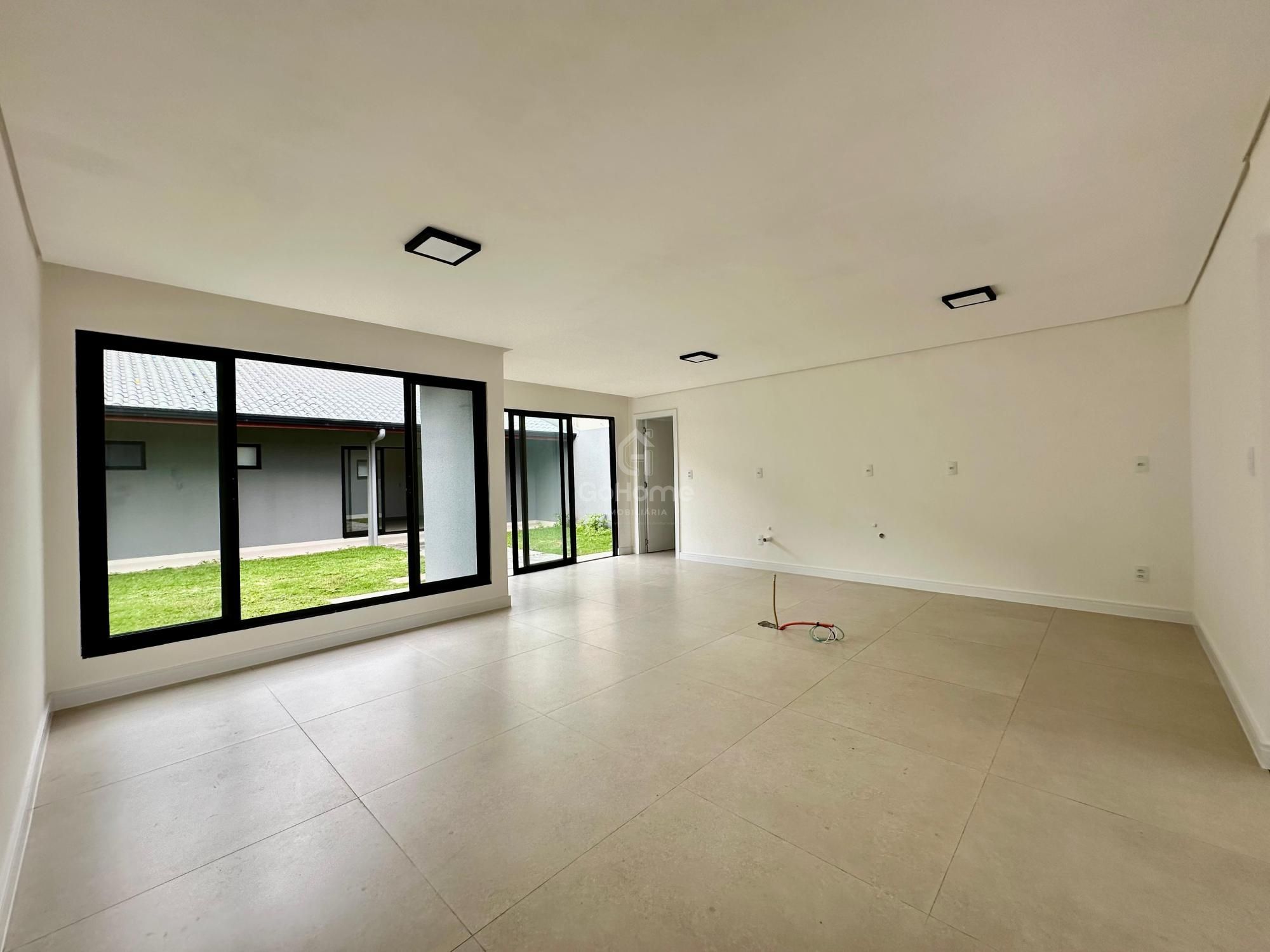 Casa com quatro dormitórios, sendo duas suítes à venda