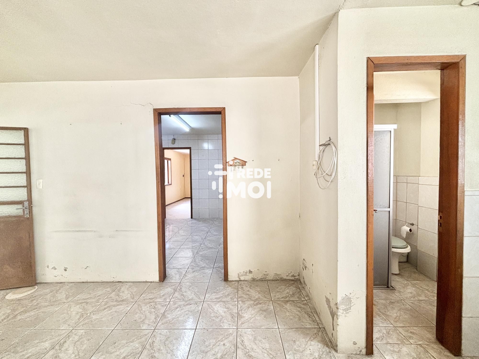 Área de serviço com banheiro