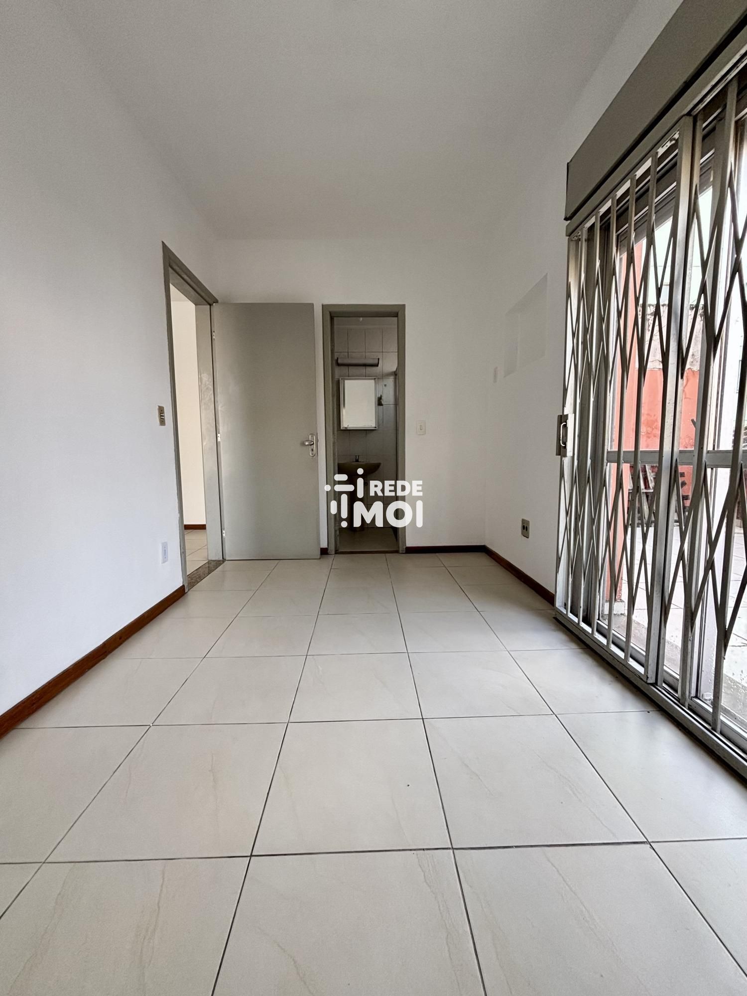 dormitorio com suite