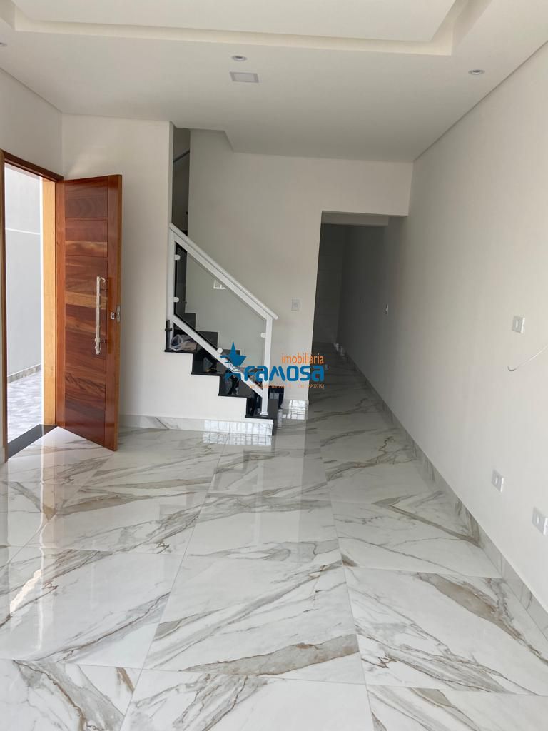 Casa à venda com 3 quartos, 100m² - Foto 1