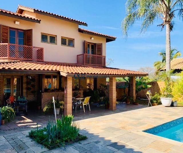 Casa de Condomínio à venda com 4 quartos, 450m² - Foto 1