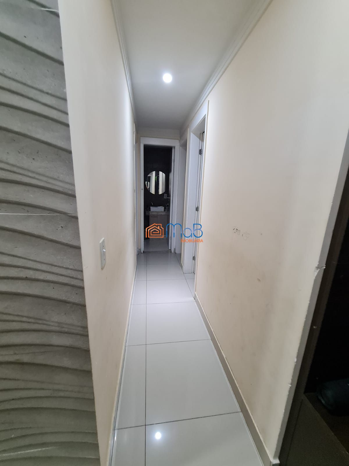 Apartamento 03 quartos com suíte e garagem.