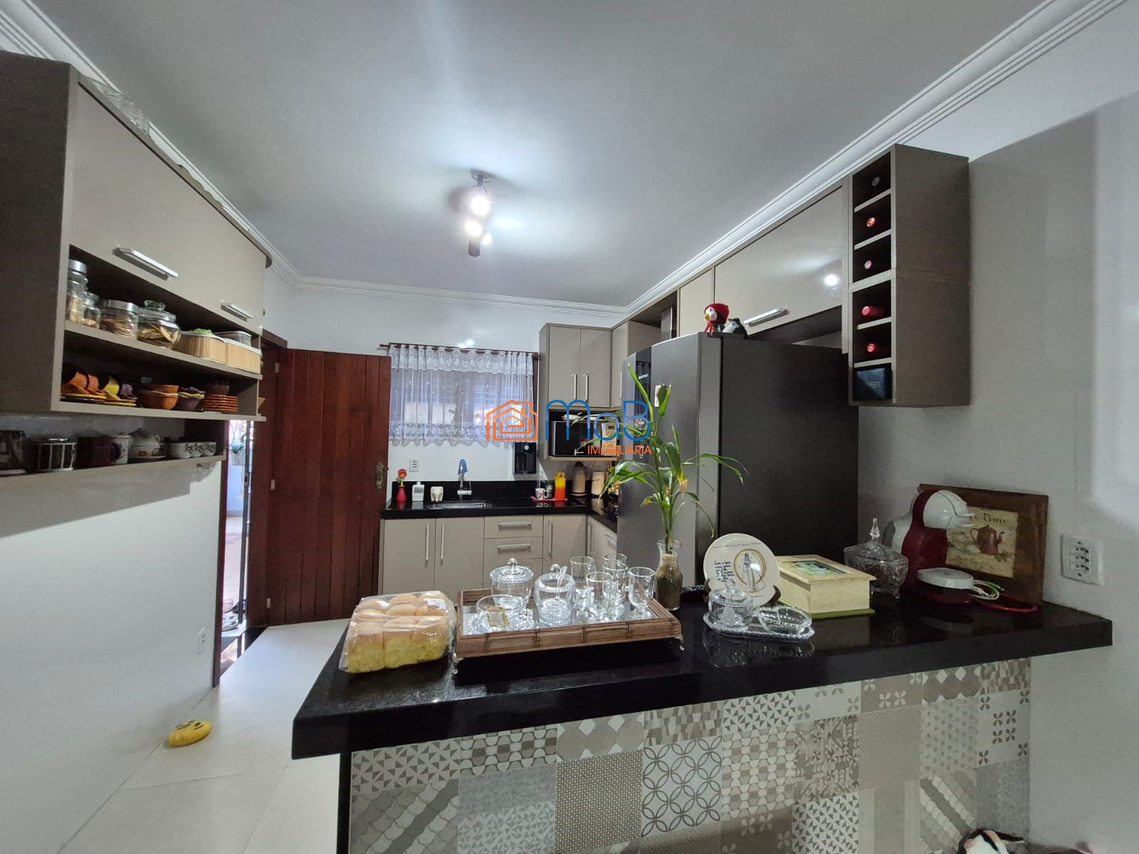 Casa de 310m² com Área Gourmet Completa e 4 Quartos
