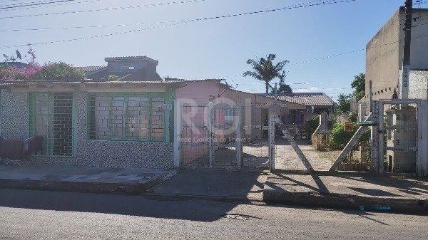 Terreno com 3 casas no pátio bairro  São Francisco TRAMANDAÌ/RS