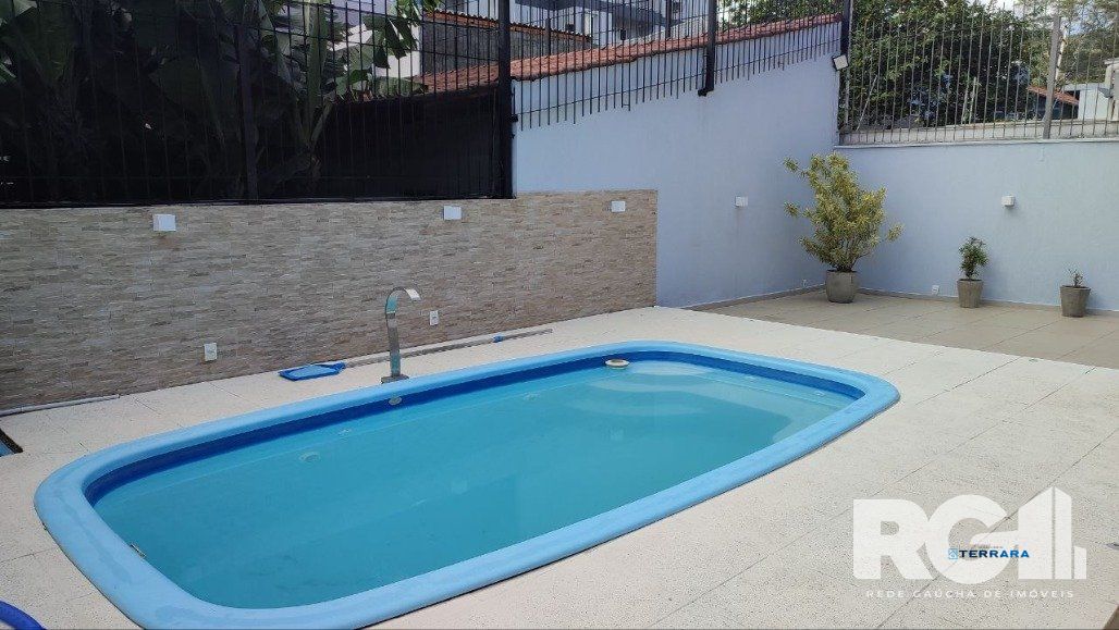 Casa com 3 dormitórios na Rua, Paulo Madureira Coelho, proximo ao novo Cesto, Morro Santana
