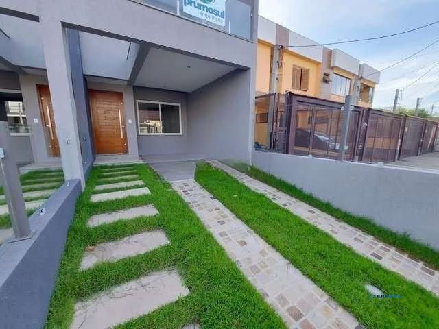 Casa a venda com 3 dormitórios no bairro Guarujá