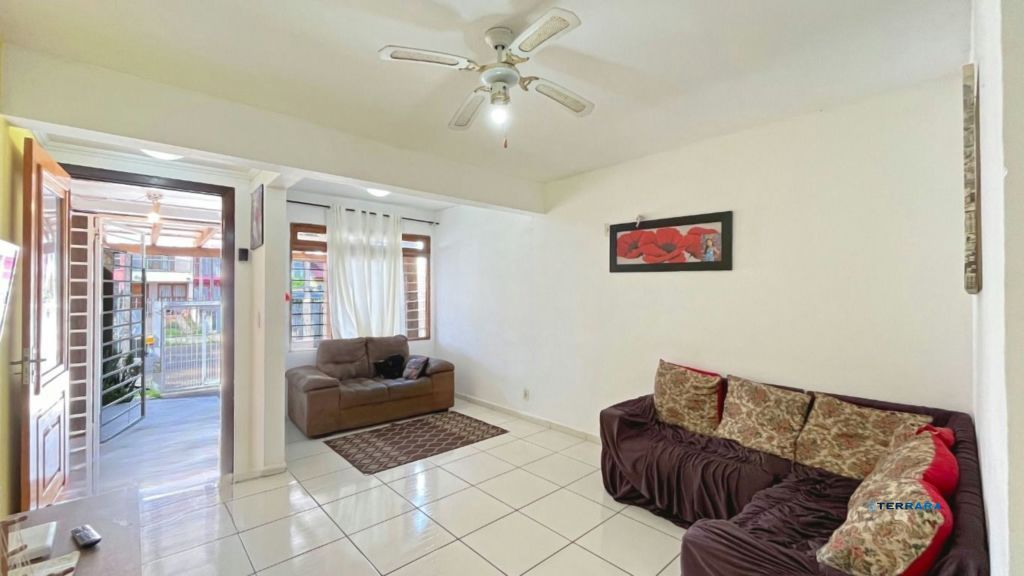 Casa de 2 dormitórios à venda Rua Heitor Kramer, Guarujá - Porto Alegre