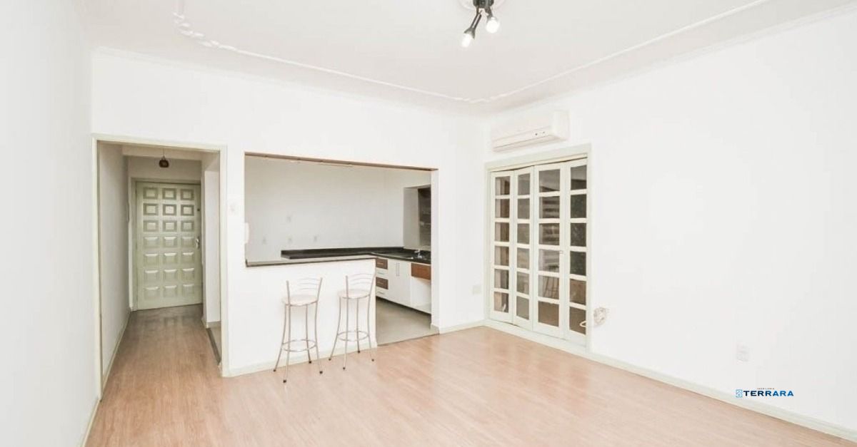 Apartamento Garden de 3 dormitórios, cozinha planejada e pátio com churrasqueira.