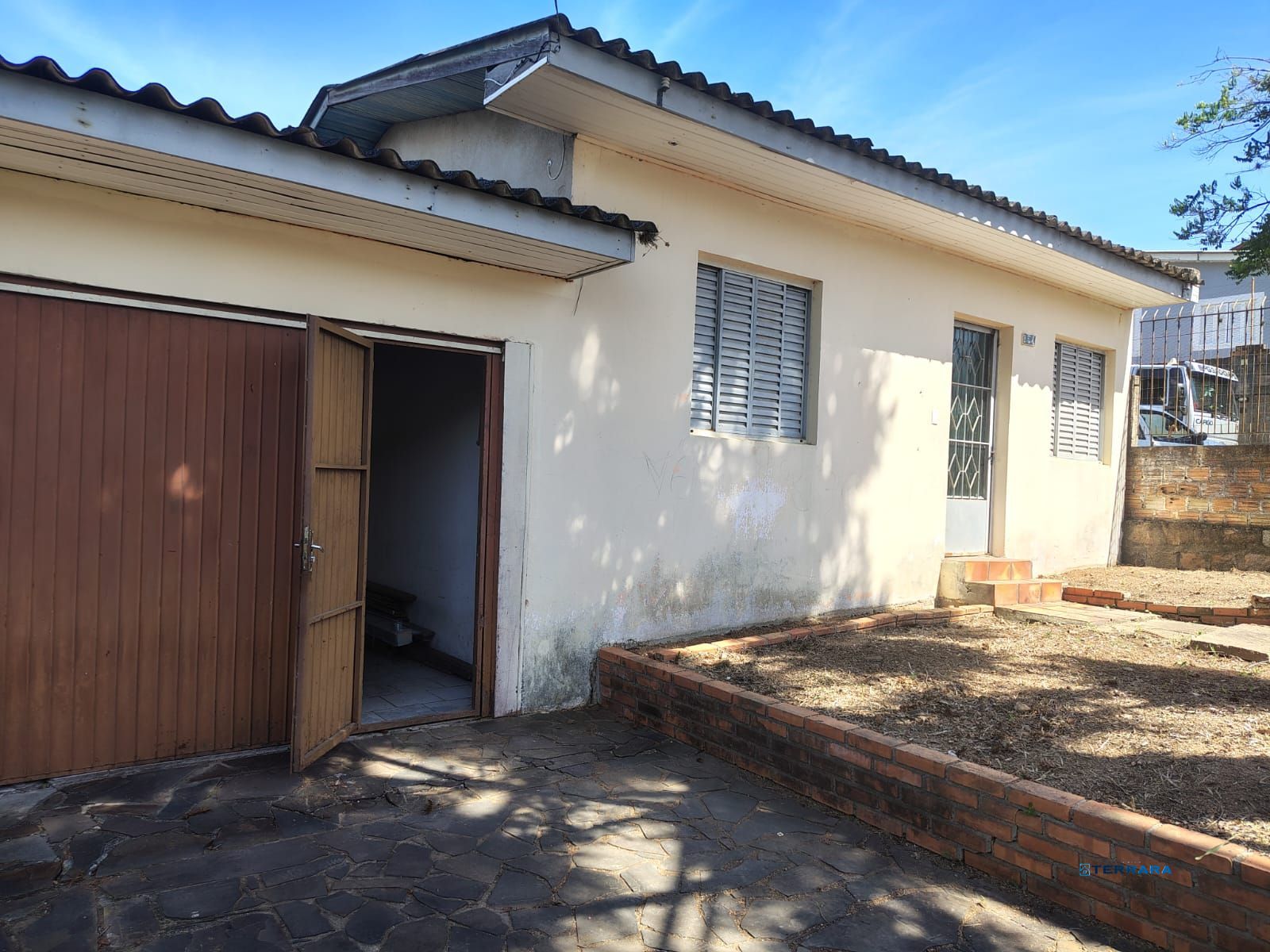 Casa térrea no bairro Vila Nova.