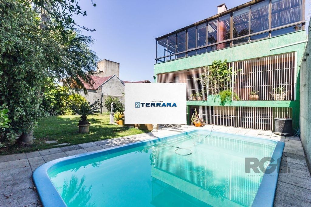 Casa 470m² - 4 dormitórios, 5 vagas no bairro Jardim São Pedro