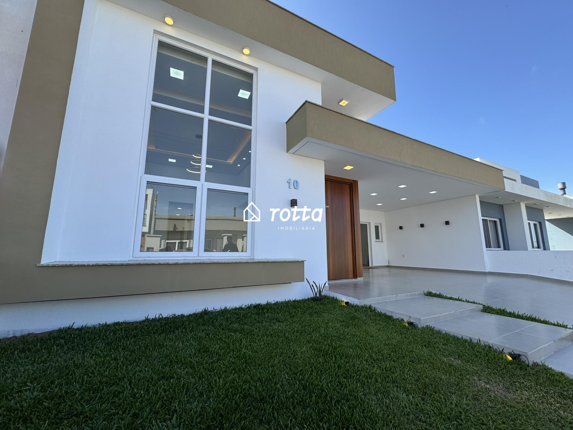 Casa com 4 Quartos, Lareira e Espaço Gourmet no Parque do Lago -  Cassino/RS