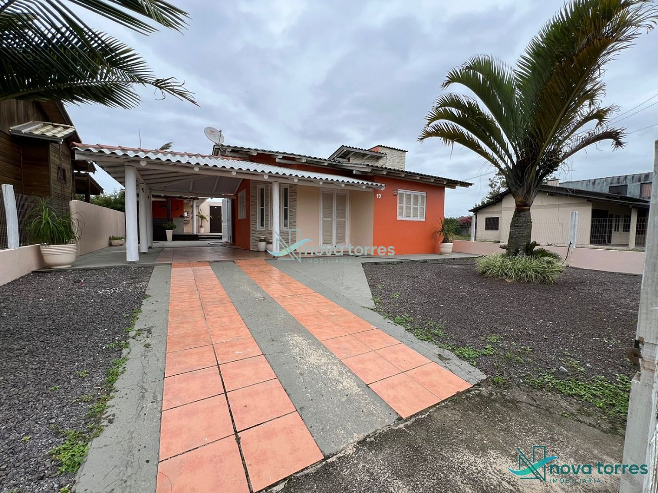 Casa com 3 dormitórios no bairro Praia Ribeiro em Passo de Torres