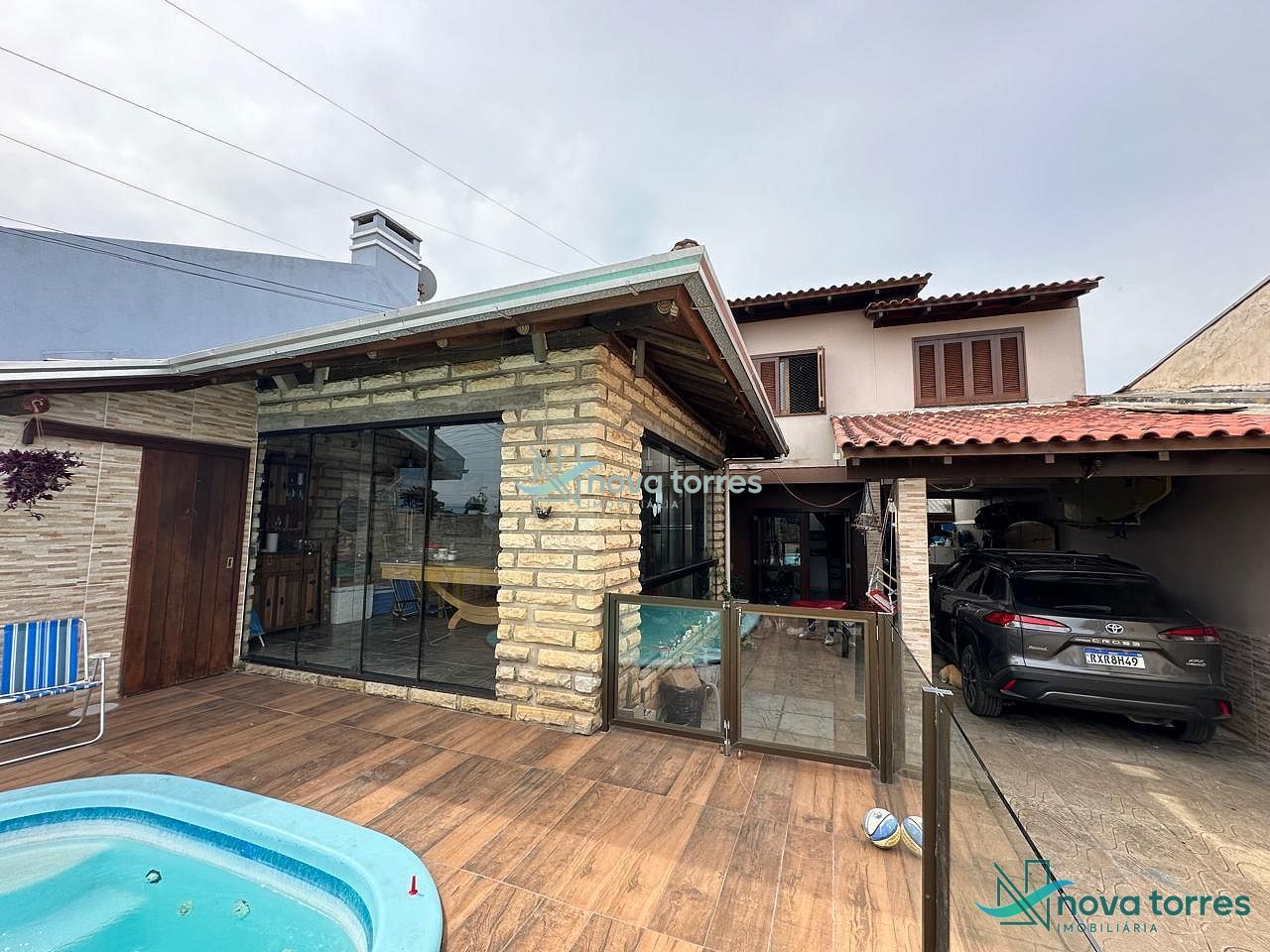 Casa mobiliada com 4 dormitórios no Igra Sul, em Torres-RS