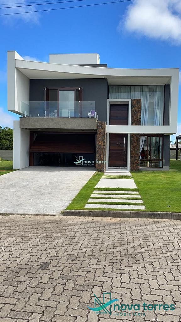 Casa com 4 suítes condomínio Reserva das Águas, em Torres-RS