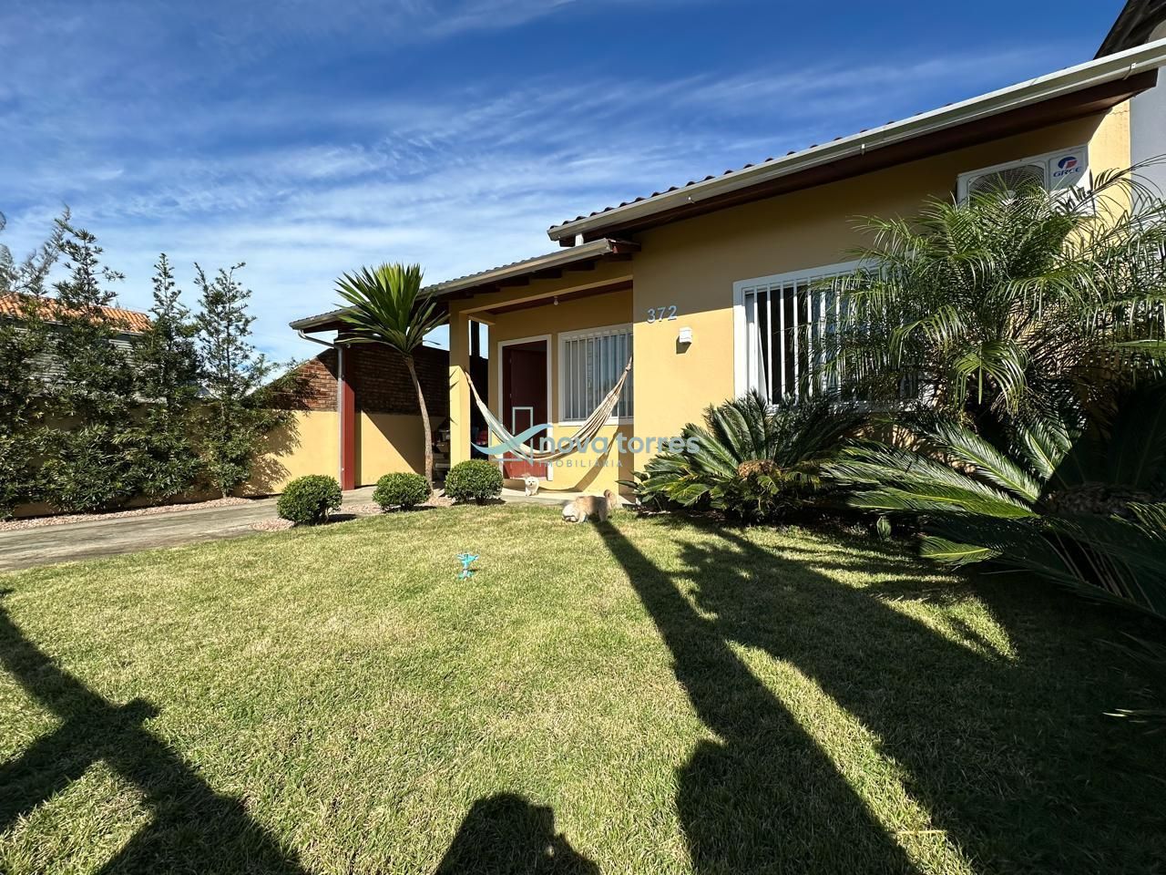 Casa Charmosa com Área Gourmet e Piscina Aquecida em Passo de Torres