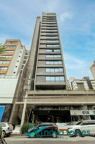 Apartamento no centro de Torres com vista mar