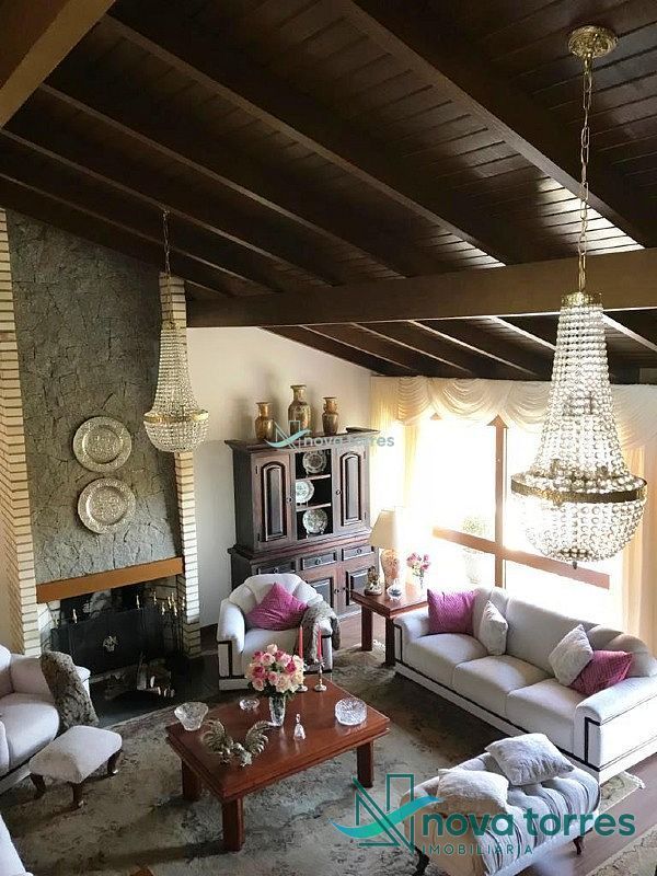 Casa com 4 dormitórios na Praia da Cal, Torres-RS