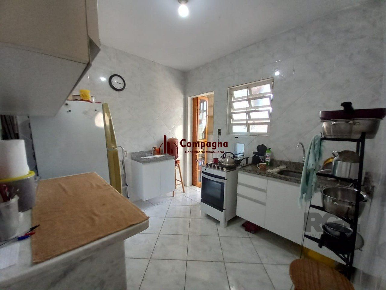 Apartamento 3 dormitórios com casa nos fundos — foto 4