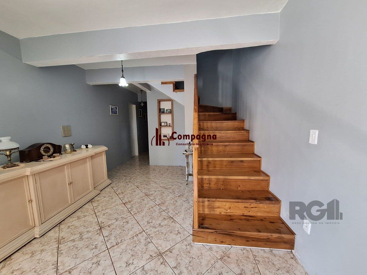 Casa com 3 dormitórios, suíte, lareira, Jardim Algarve em Alvorada - RS. — foto 3