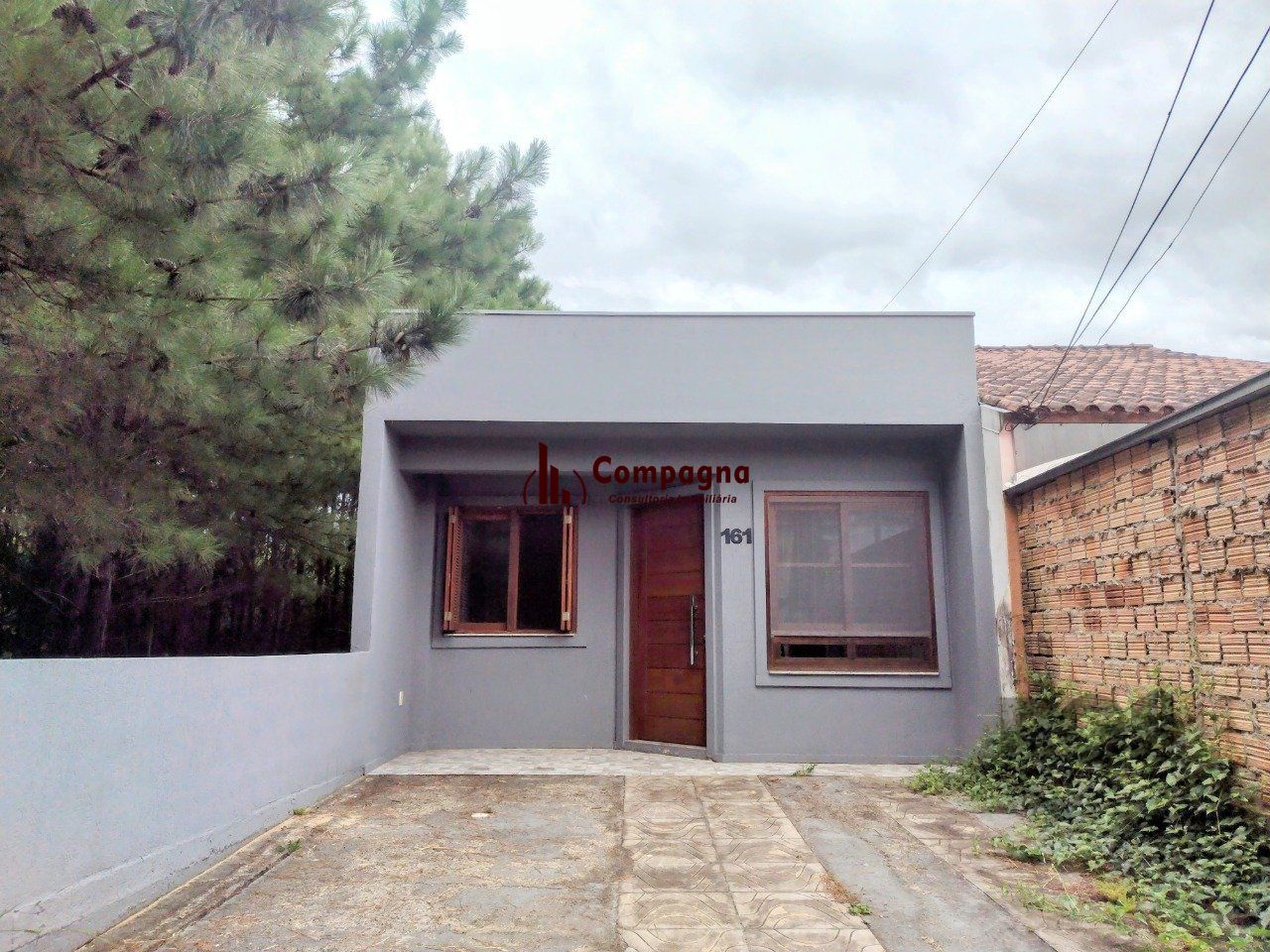 CASA TÉRREA - 2 DORMITÓRIOS, ÁREA COBERTA COM CHURRASQUEIRA , TERRAÇO - 02 VAGAS — foto 2