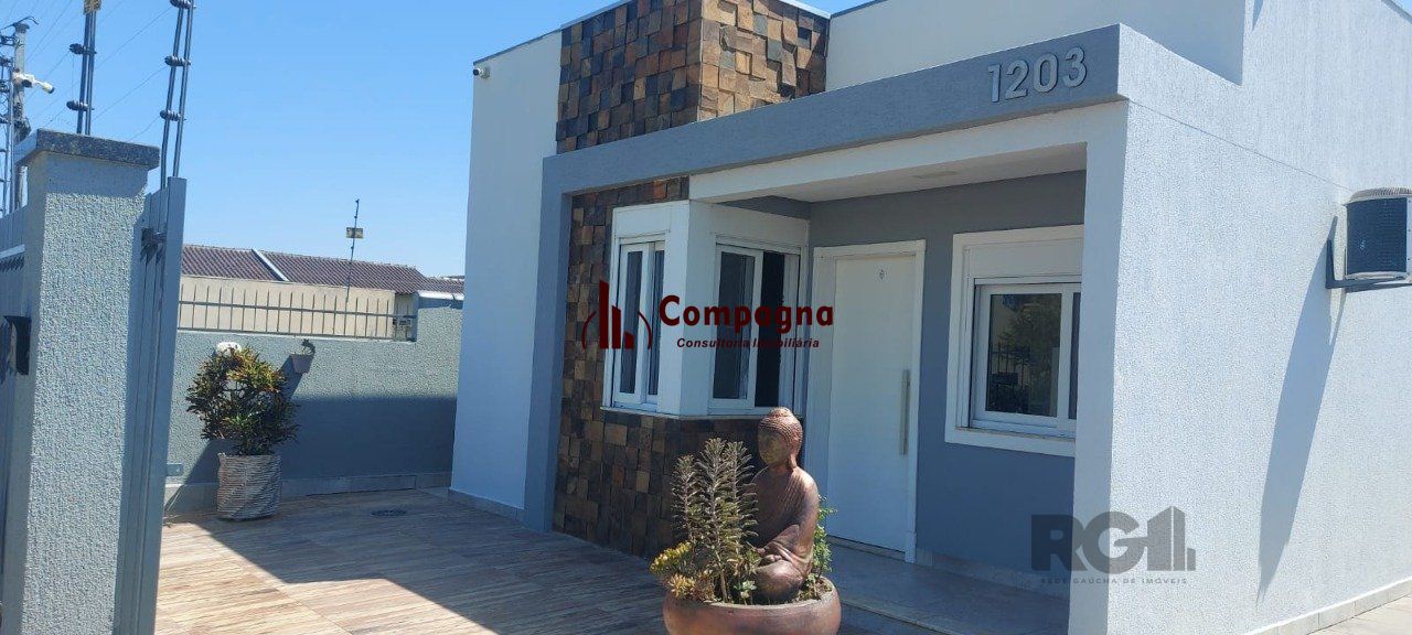 Casa com 2 dormitórios, sendo 1 suíte no bairro Florida em Guaíba