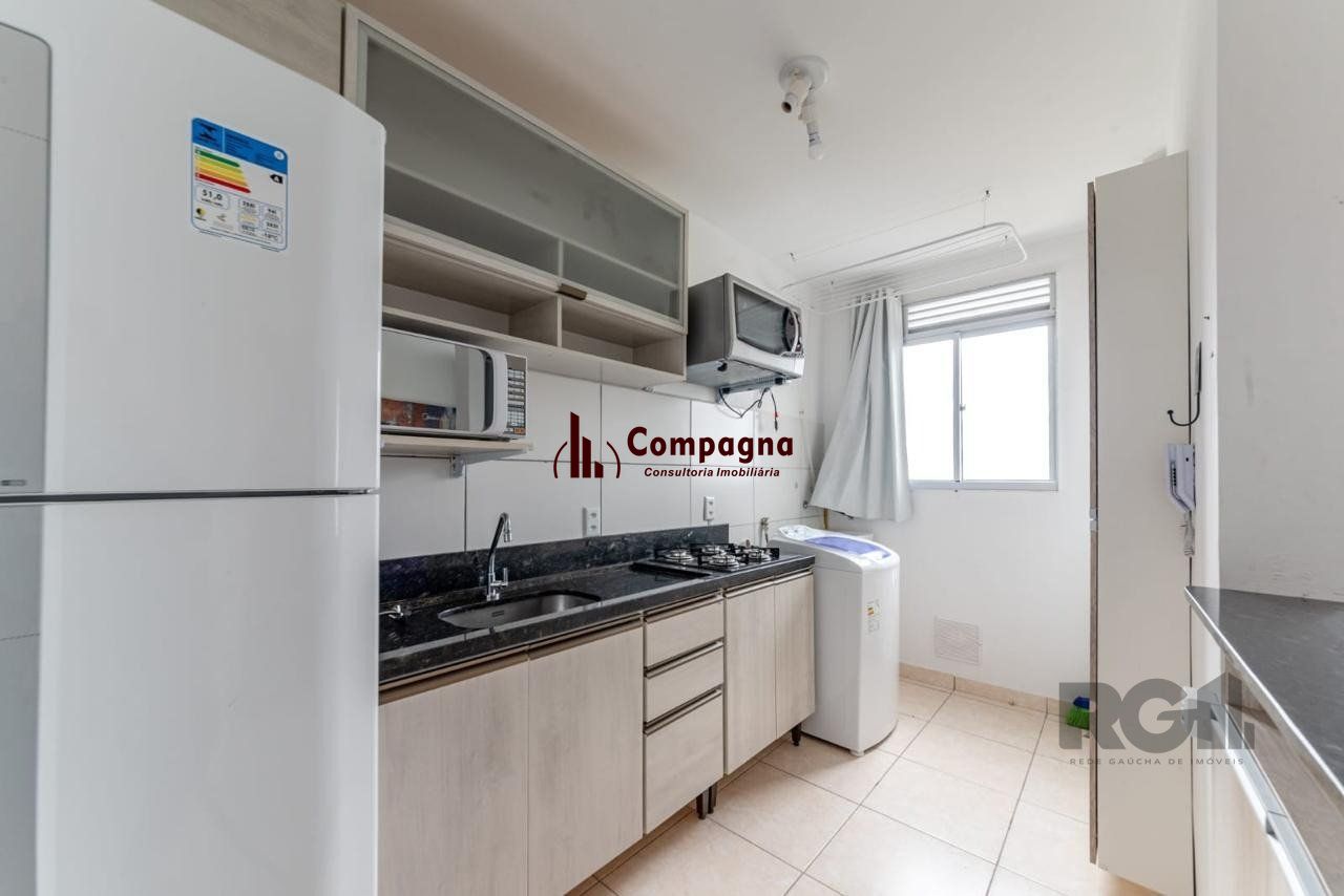 Apartamento 2 dormitórios e uma vaga no bairro morro santana com sacada. — foto 4