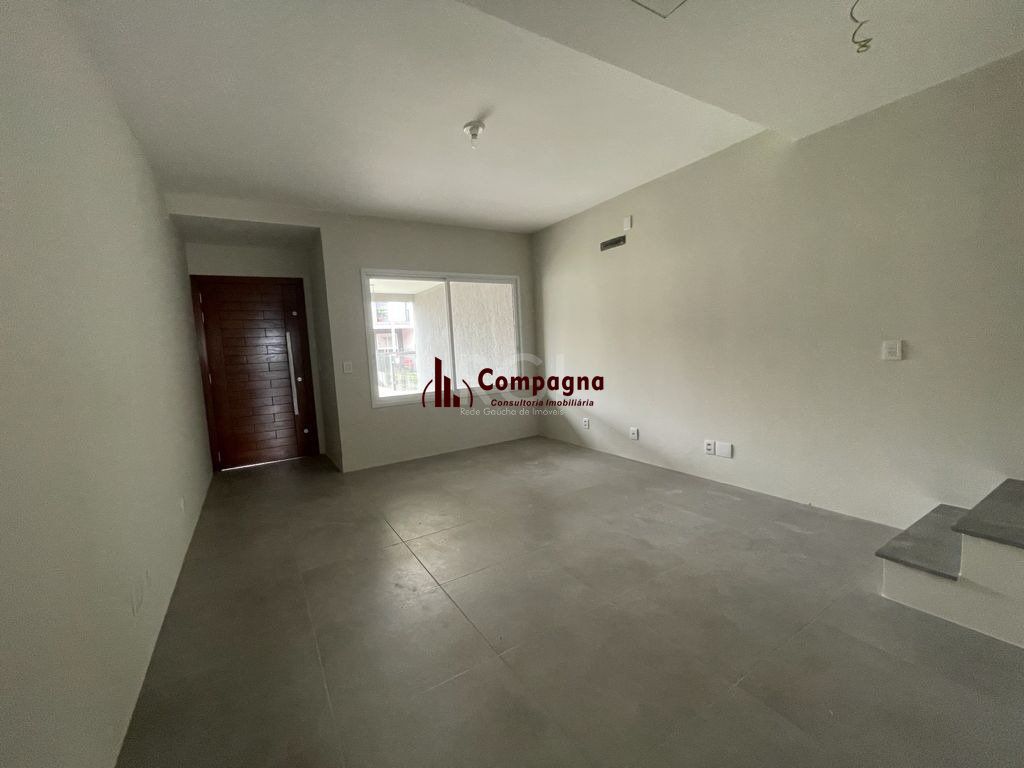 Casa 3 dormitórios, sendo 1 suites, 2 vagas - Guarujá, Porto Alegre RS — foto 3