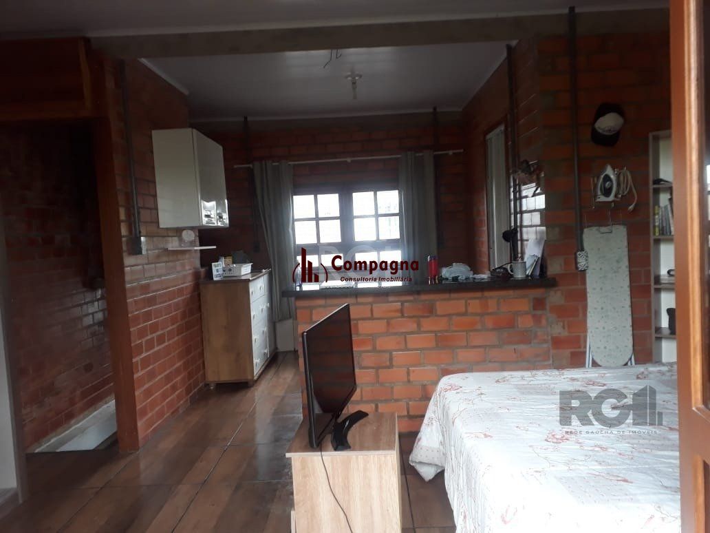 Casa com 3 dormitórios, sendo 1 suíte no bairro Hípica — foto 5