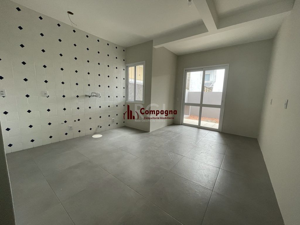 Casa 3 dormitórios, sendo 1 suites, 2 vagas - Guarujá, Porto Alegre RS — foto 5