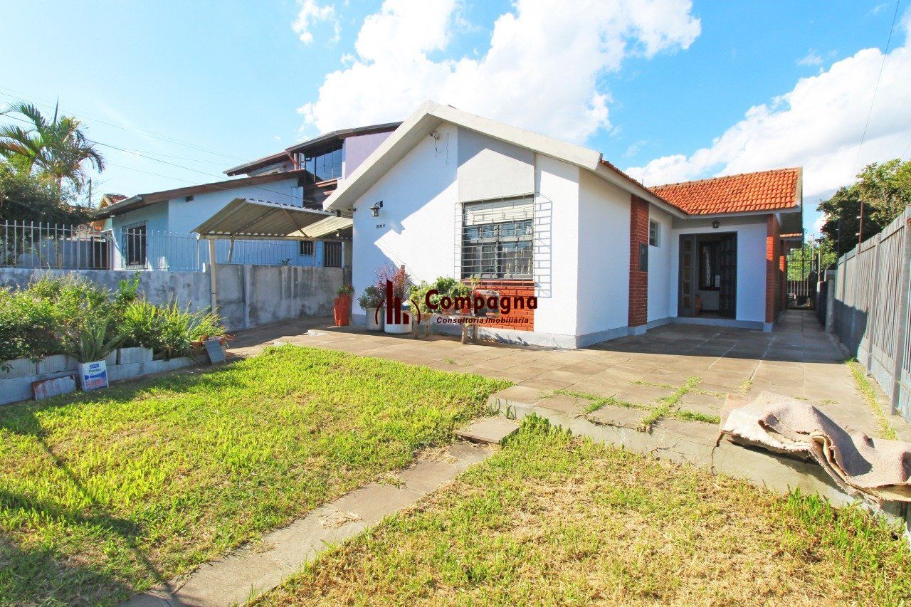 Casa 5 dormitórios, 1 suíte, 2 vagas de garagem, no bairro Camaquã, Poa/RS.