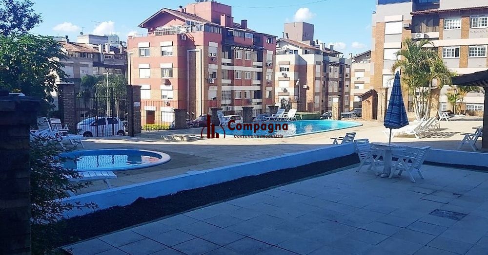Apartamento 02 dormitórios - sacada com churrasqueira peças amplas em Tradicional condomínio no Bairro Cavalhada - 01 vaga escriturada — foto 2