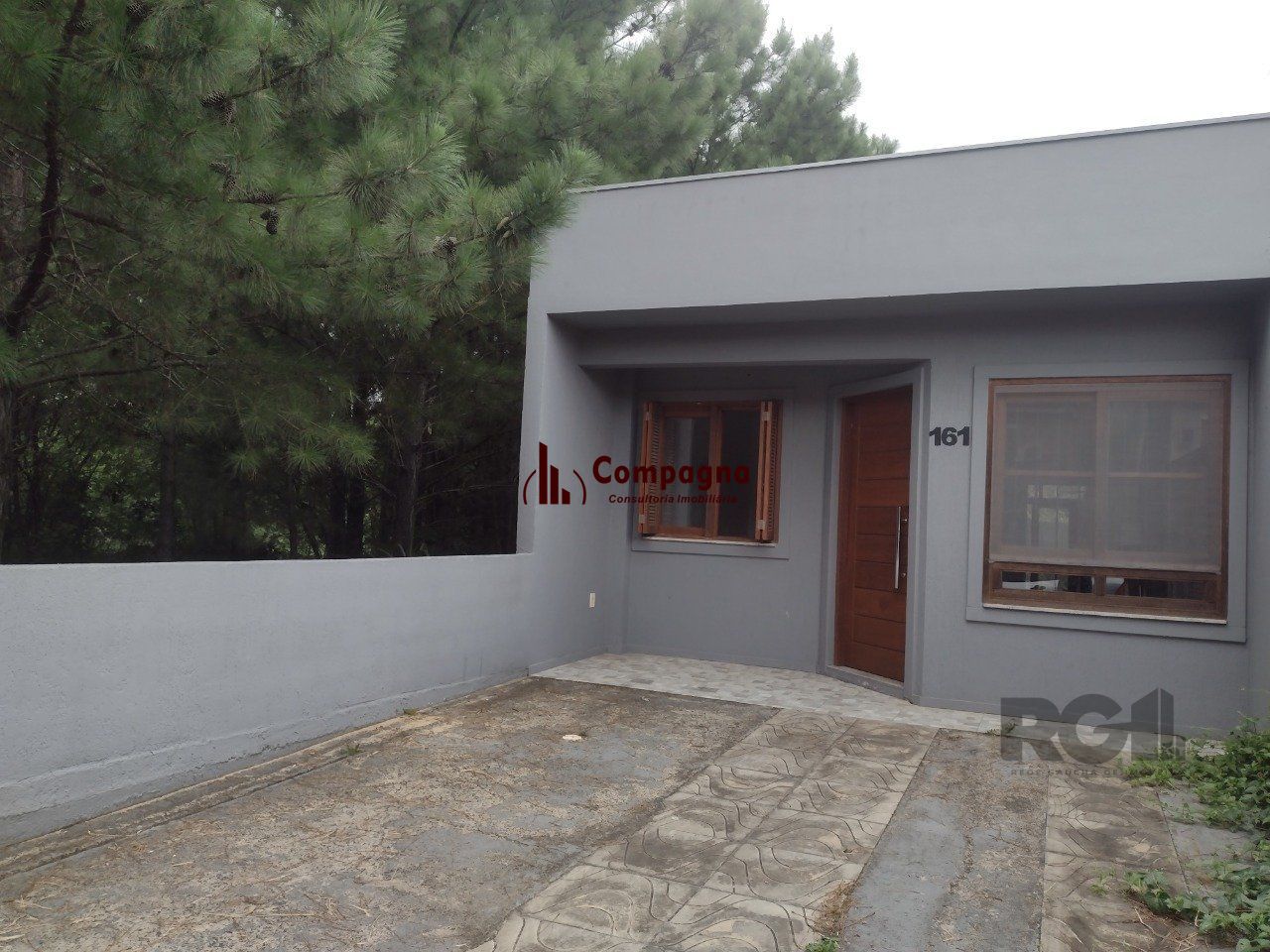 CASA TÉRREA - 2 DORMITÓRIOS, ÁREA COBERTA COM CHURRASQUEIRA , TERRAÇO - 02 VAGAS — foto 3