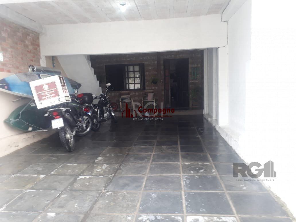 Casa com 3 dormitórios, sendo 1 suíte no bairro Hípica — foto 2