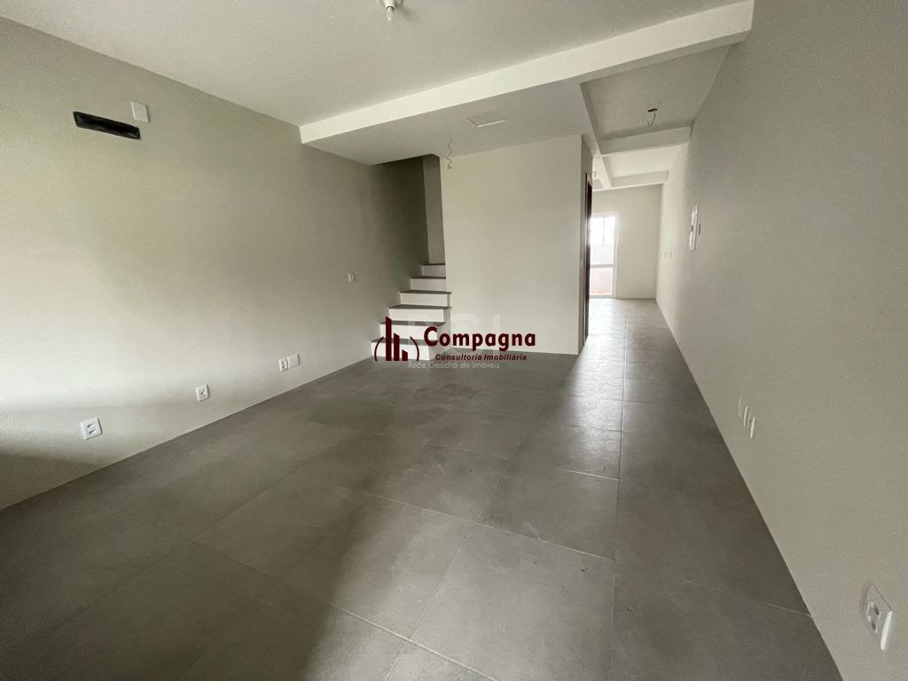 Casa 3 dormitórios, sendo 1 suites, 2 vagas - Guarujá, Porto Alegre RS — foto 2
