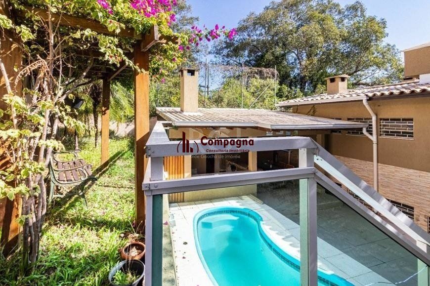 Excelente casa de 264m² com 4 dormitórios no bairro Menino Deus — foto 2