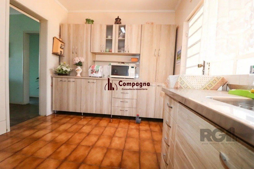 Casa com 3 dormitórios no bairro Cristo Redentor — foto 4