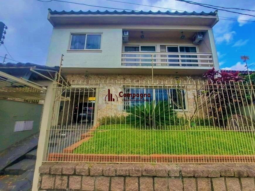 Excelente casa com 3 dormitórios e 3 vagas de garagem — foto 2