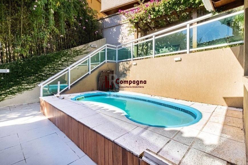 Excelente casa de 264m² com 4 dormitórios no bairro Menino Deus — foto 3