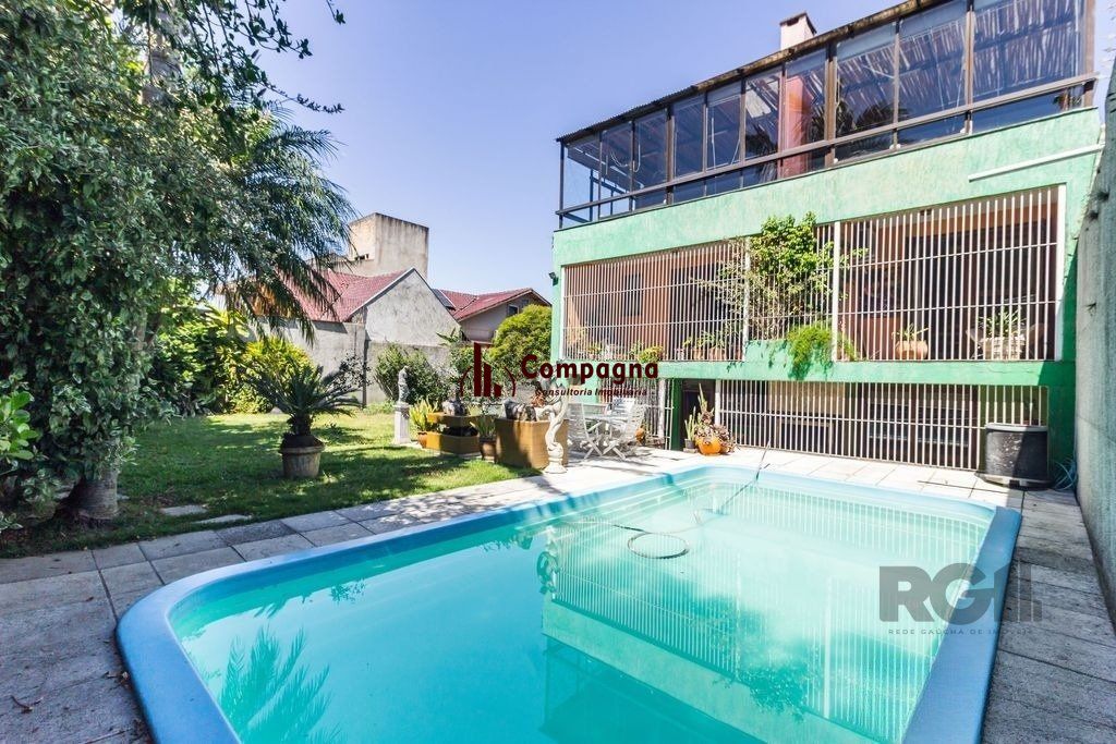Casa 470m² - 4 dormitórios, 5 vagas no bairro Jardim São Pedro