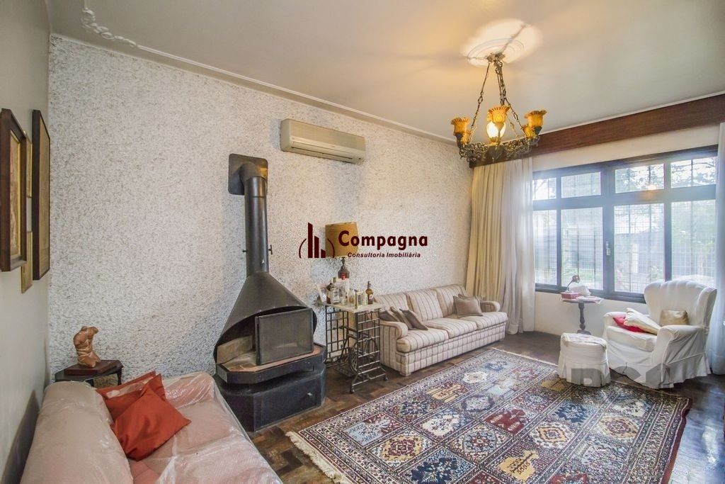 Casa de 4 dormitórios, bairro Santa Tereza — foto 2