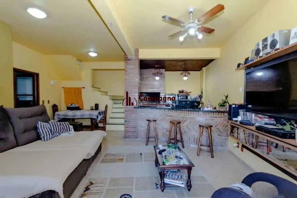 Casa à venda com 3 dormitórios, 1 suíte e espaço gourmet em terreno alto — foto 2
