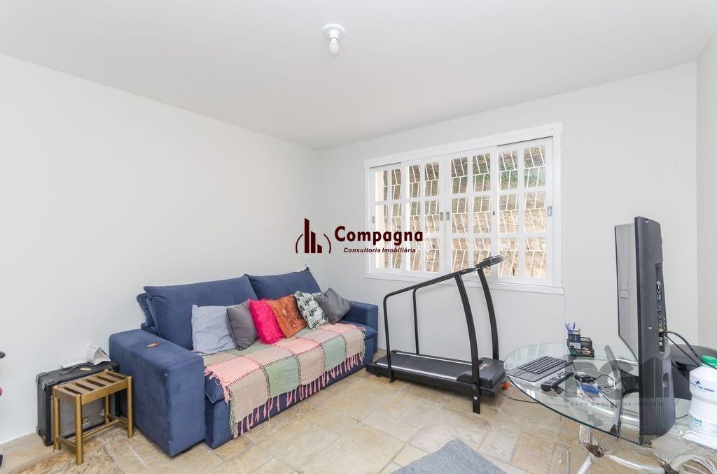 Casa de 4 dormitórios no bairro Três Figueiras — foto 5