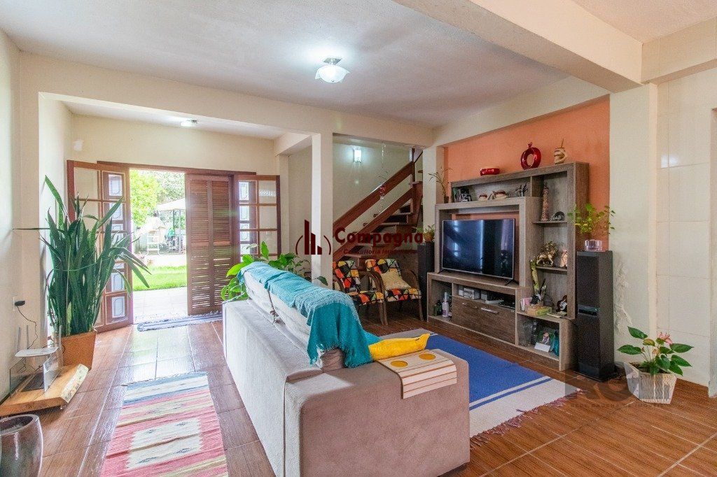 Casa com 3 dormitórios e 3 vagas no bairro Santa Tereza — foto 4