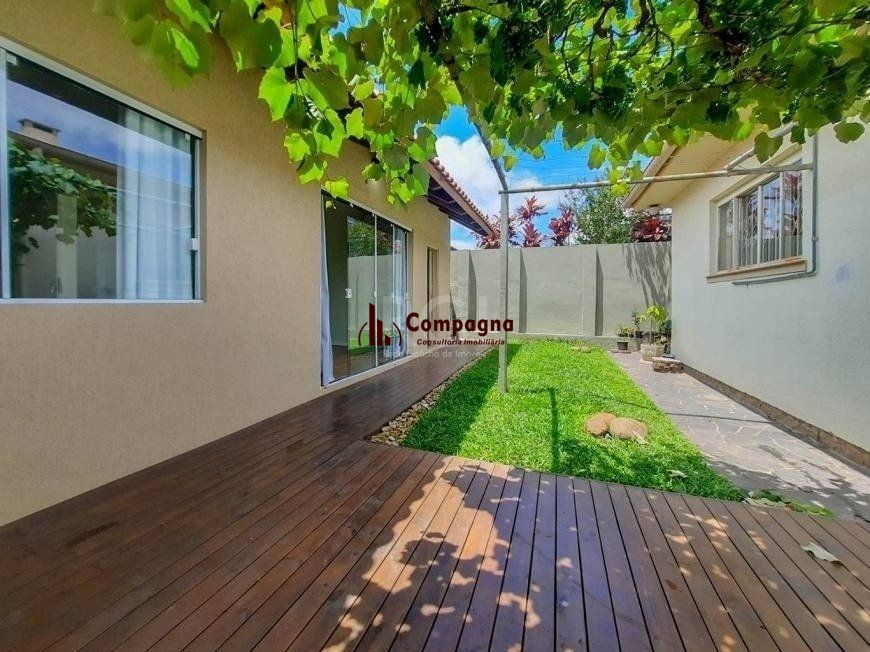 Excelente casa com 3 dormitórios e 3 vagas de garagem — foto 4