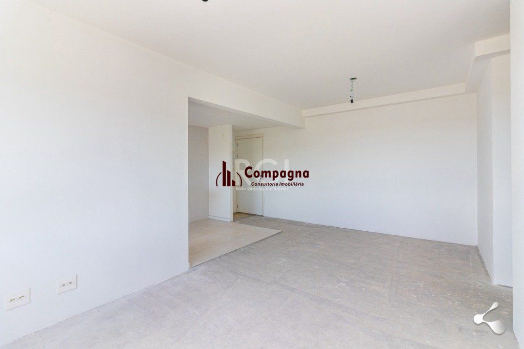 Vende apartamento, 03 dormitórios, living para dois ambientes, banheiro social, cozinha com churrasqueira e área de serviço e garagem. — foto 3