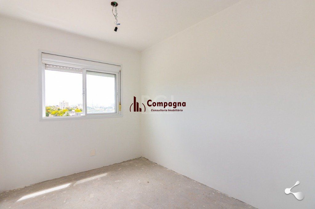 vende 03 dormitórios, living para dois ambientes, banheiro social, cozinha com churrasqueira e área de serviço com garagem — foto 2