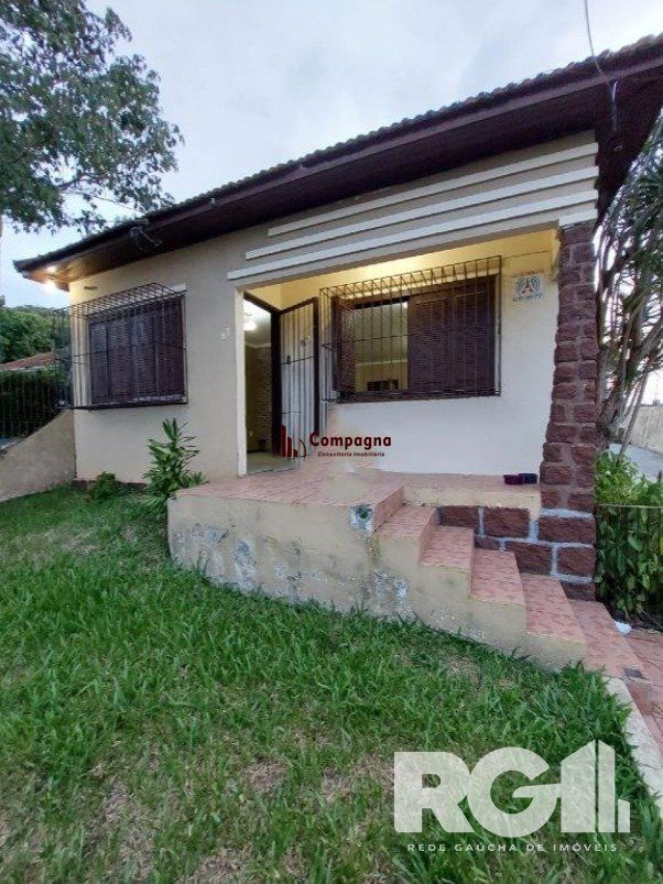 Linda Residência com cinco dormitórios no centro da cidade de Viamão/RS