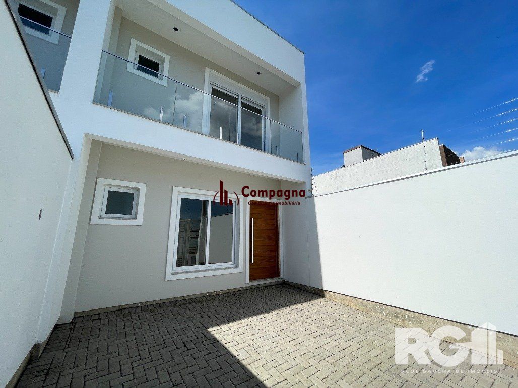 Casa em bairro planejado de Canoas com excelência em beleza e qualidade. — foto 2
