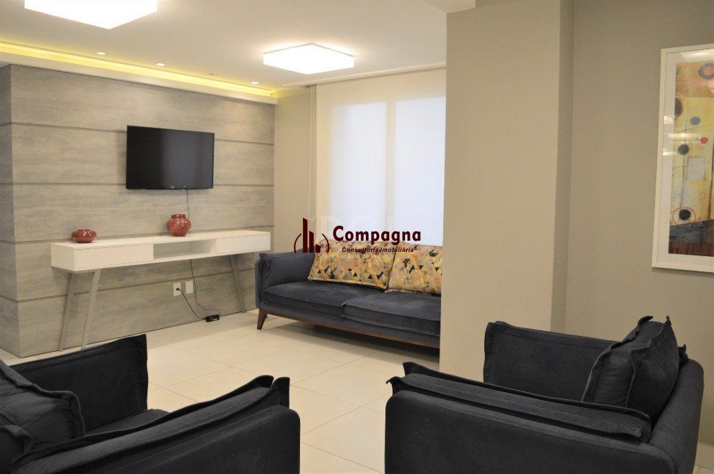 Excelente, amplo e ensolarado apartamento 3 dormitórios sendo 1 suíte, com living 2 ambientes, banheiro social, semimobiliado e com 2 vagas de garagem. — foto 5