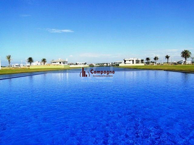 Excepcional sobrado 5 dormitórios com 5 suítes, totalmente mobiliado e ricamente decorado a beira lago em Xangrilá, no Condomínio Enseada. — foto 4